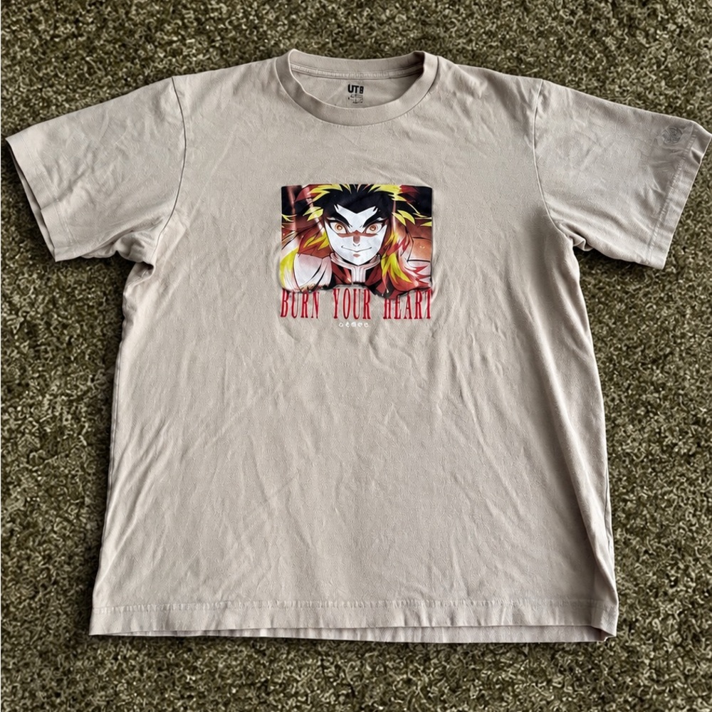 Uniqlo Light Beige Graphic Tee with Bold Anime Print